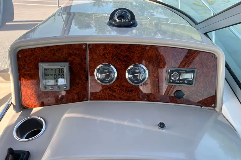 Slide: The Image of Dashboard of a 2005 Formula 34 Performance Cruiser with gauges and controls. - 11