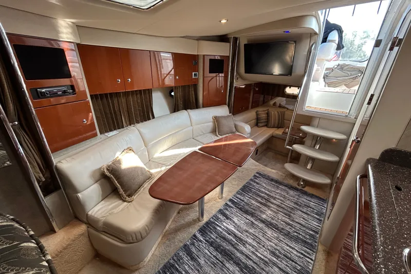 Slide: The Image of Luxurious interior of a 2005 Formula 34 Performance Cruiser with plush seating and modern amenities. - 18