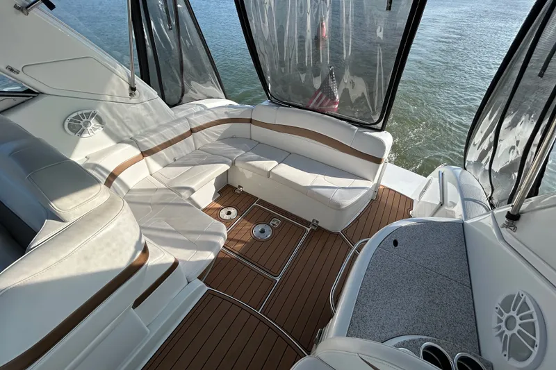 Slide: The Image of Luxurious 2005 Formula 34 Performance Cruiser interior with elegant seating and wood flooring. - 5