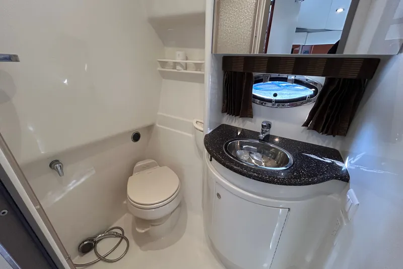 Slide: The Image of Bathroom interior of 2005 Formula 34 Performance Cruiser with sink and toilet. - 22