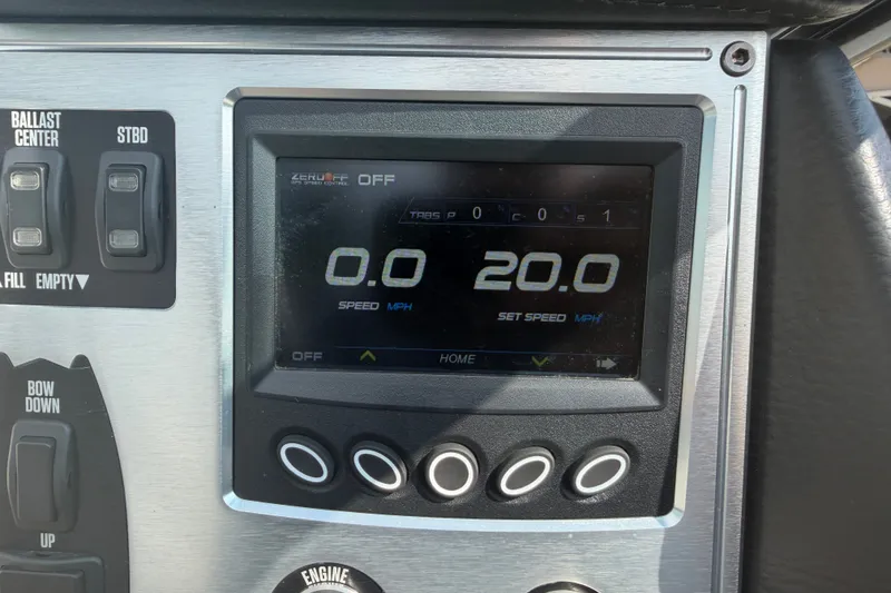 Slide: The Image of Dashboard of a 2019 MasterCraft NXT20 boat showing speed controls and settings. - 6