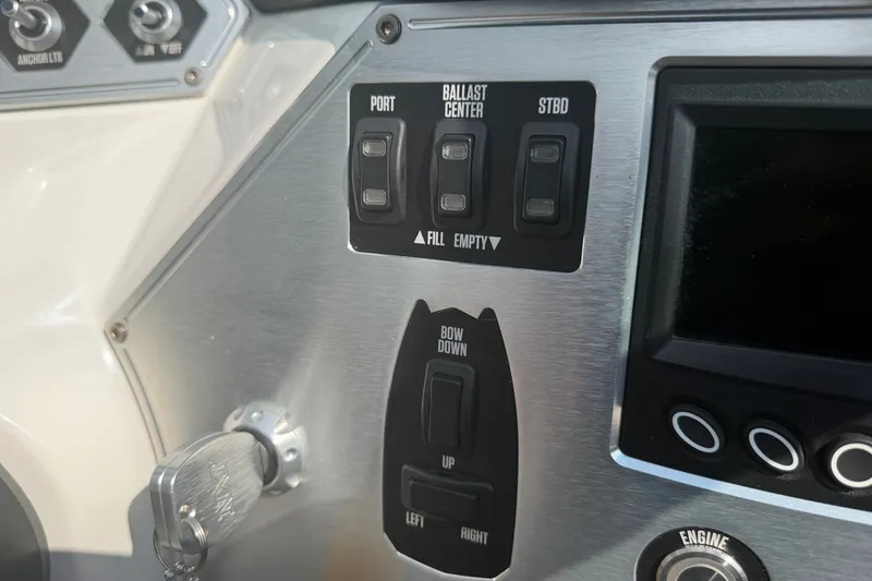 Slide: The Image of Control panel of a 2019 MasterCraft NXT20 boat with ballast and bow controls. - 7