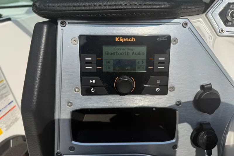 Slide: The Image of Control panel of a 2019 MasterCraft NXT20 boat with Klipsch Bluetooth audio system. - 9