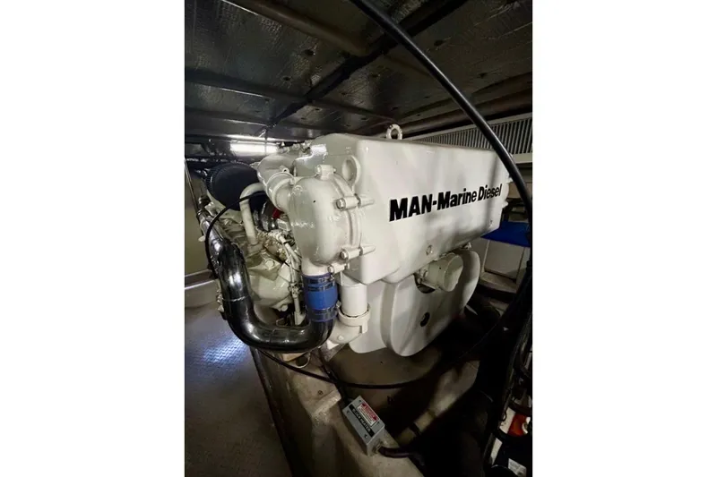 Slide: The Image of Engine room of 2001 Sea Ray 560 Sedan Bridge with MAN Marine Diesel engine. - 30