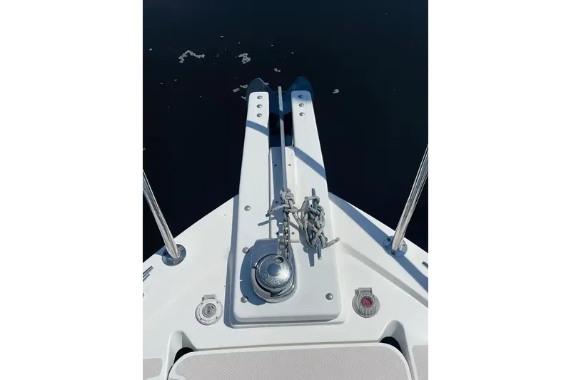 Slide: The Image of Bow of 2005 Back Cove 29 boat with anchor and calm water. - 19