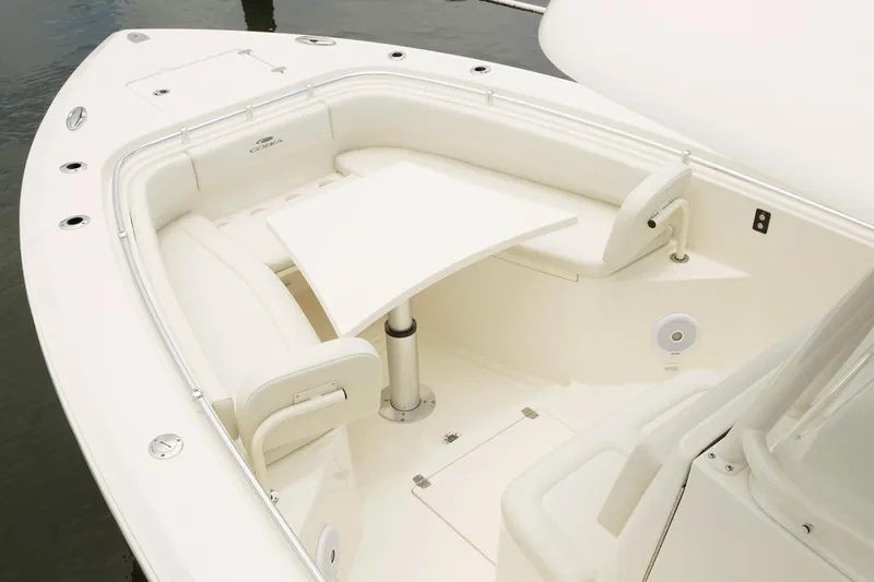 Slide: The Image of Manufacturer Provided Image: 2020 Cobia 301 Center Console boat with spacious seating and table. - 6