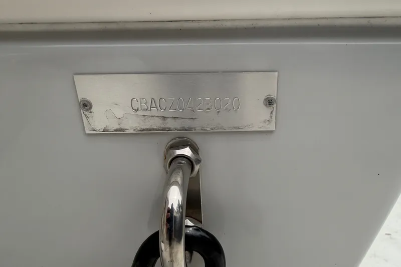 Slide: The Image of Hull identification number on 2020 Cobia 301 Center Console boat. - 37