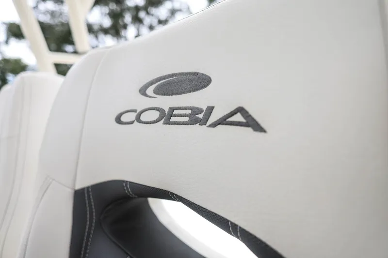 Slide: The Image of Cobia 301 Center Console 2020 boat seat with logo embroidery. - 32