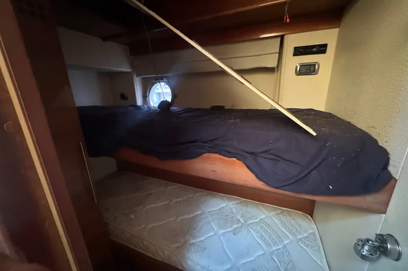 Slide: The Image of Interior cabin of 2007 Aicon 64 yacht with bunk beds and porthole window. - 15