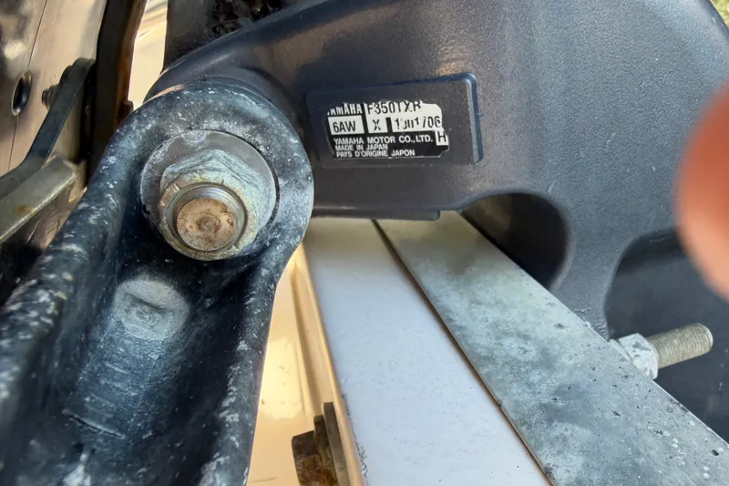 Slide: The Image of Close-up of a Yamaha F350TXR engine part on a 2009 Grady-White Express 360 boat. - 33