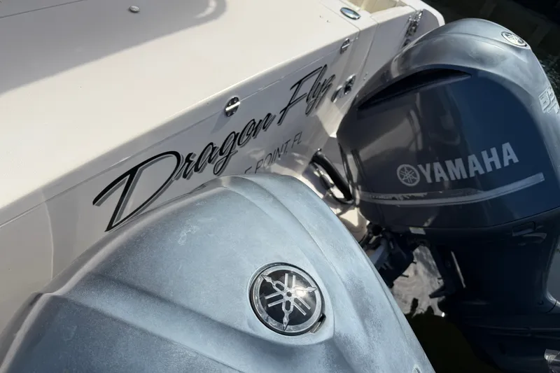 Slide: The Image of 2009 Grady-White Express 360 boat with Yamaha outboard engines, featuring "Dragon Fly" name. - 31