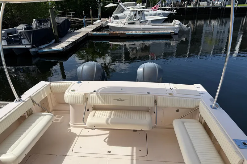 Slide: The Image of 2009 Grady-White Express 360 boat interior with seating, docked at marina. - 26