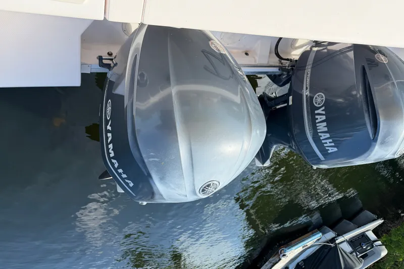 Slide: The Image of 2009 Grady-White Express 360 with dual Yamaha outboard motors on water. - 30
