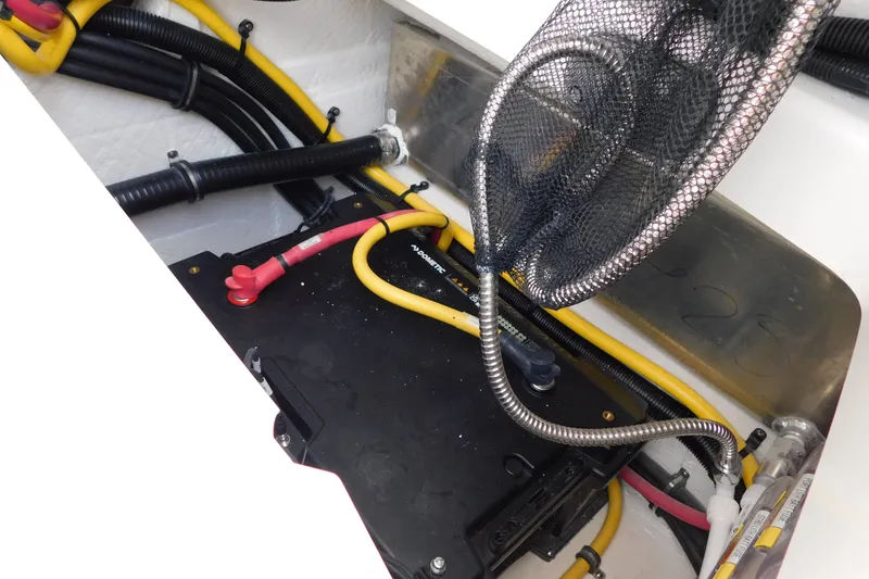 Slide: The Image of Electrical wiring and battery compartment of a 2027 Regulator 35 boat. - 50