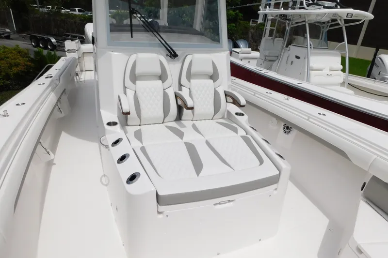 Slide: The Image of 2027 Regulator 35 boat with luxurious white seating and sleek design. - 42