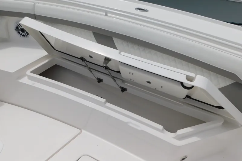 Slide: The Image of Open storage compartment on a 2027 Regulator 35 boat, showcasing interior design. - 37