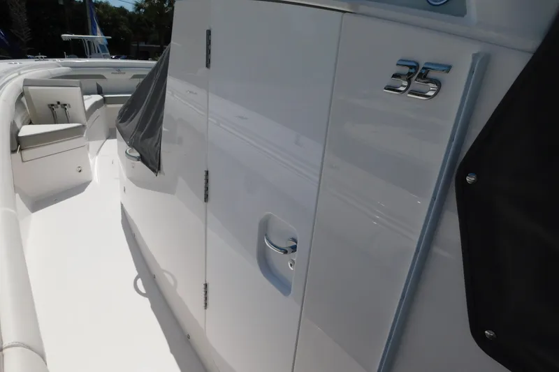 Slide: The Image of 2027 Regulator 35 boat interior, showcasing sleek design and seating area. - 69