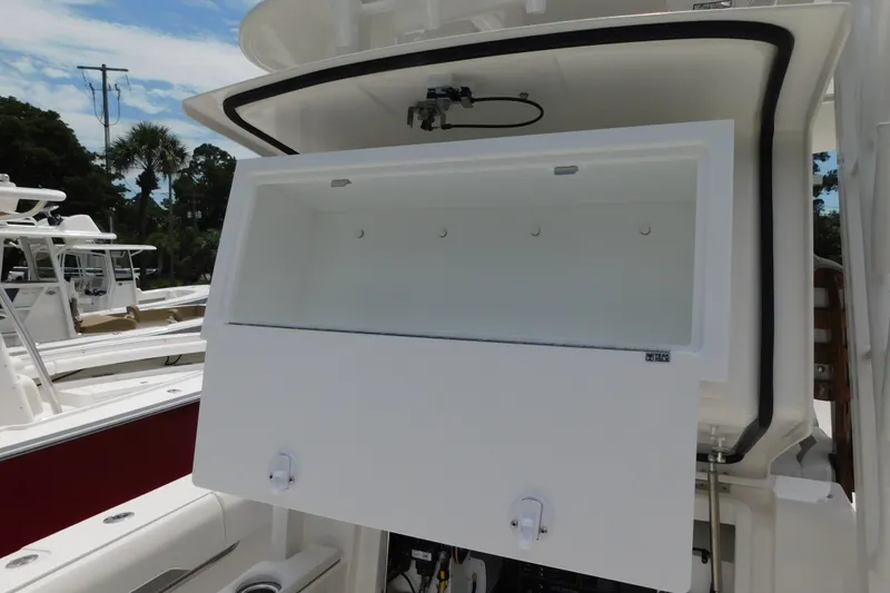 Slide: The Image of Open storage compartment on a 2027 Regulator 35 boat, showcasing interior space. - 53