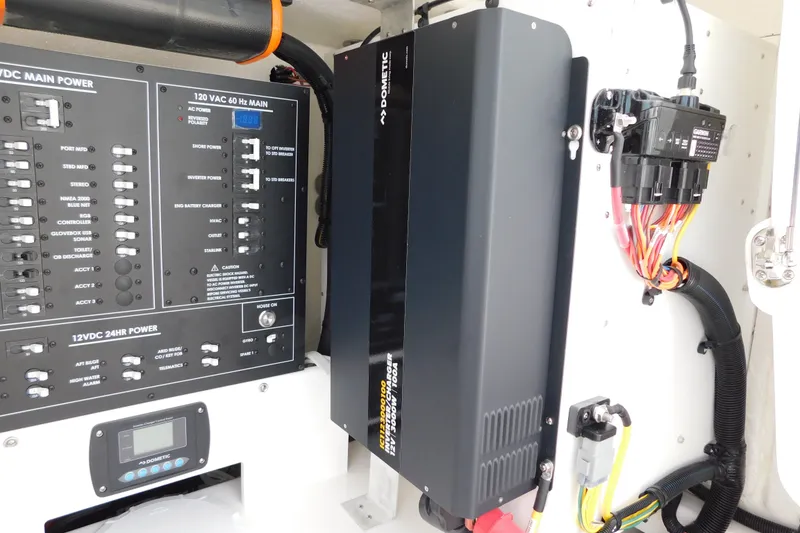 Slide: The Image of Electrical panel and components inside a 2027 Regulator 35 boat. - 47