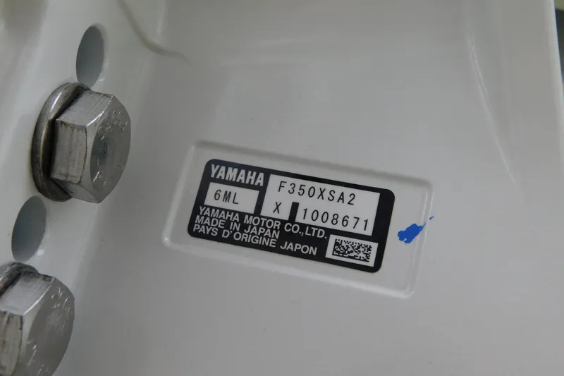 Slide: The Image of Yamaha motor label on Regulator 35, 2027 model, showing serial number and origin details. - 70