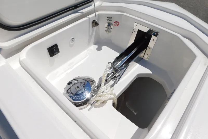 Slide: The Image of Anchor compartment of 2027 Regulator 35 boat with winch and rope. - 66