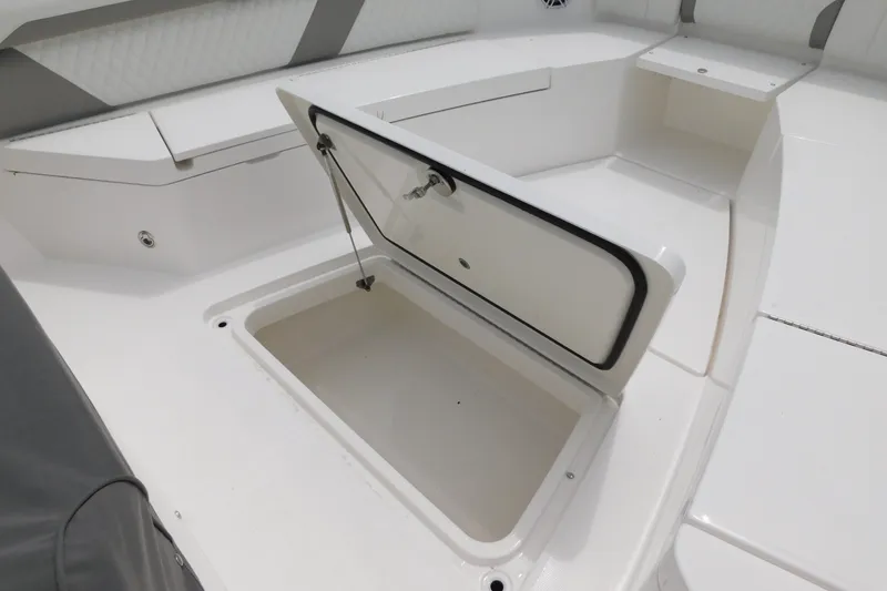 Slide: The Image of Open storage compartment on 2027 Regulator 35 boat deck, showcasing spacious interior. - 34