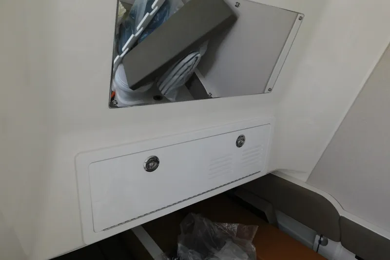 Slide: The Image of Interior storage compartment of 2027 Regulator 35 boat. - 54