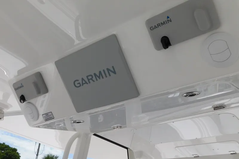 Slide: The Image of 2027 Regulator 35 boat featuring Garmin electronics on the dashboard. - 39