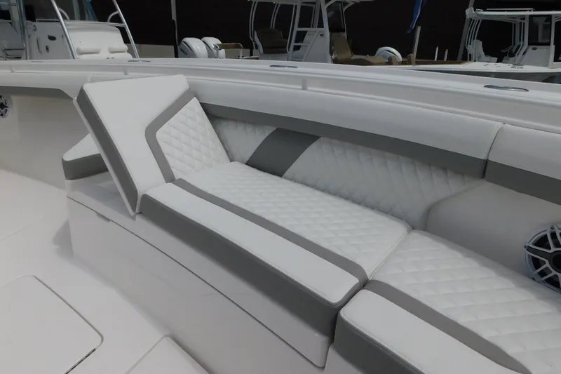 Slide: The Image of Luxurious seating on 2027 Regulator 35 boat with quilted upholstery and modern design. - 9