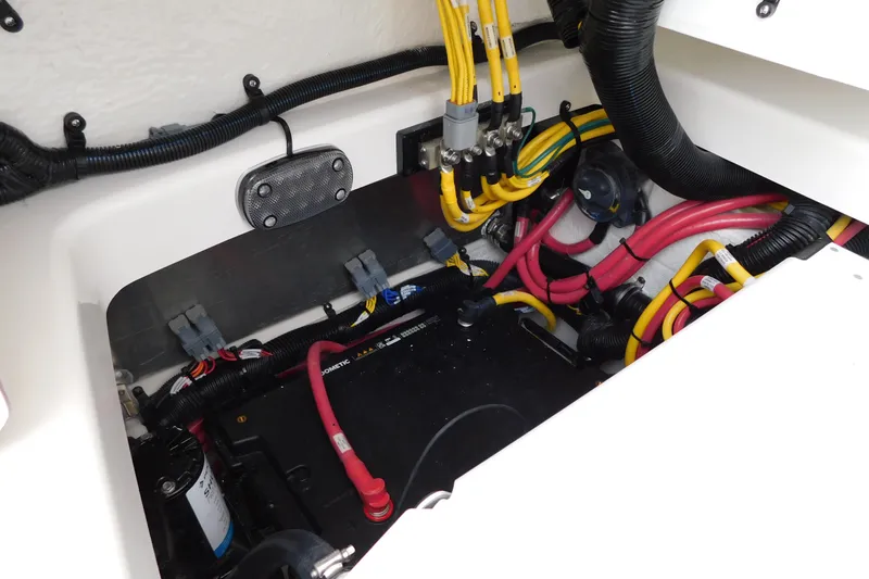 Slide: The Image of Electrical wiring and components inside a 2027 Regulator 35 boat. - 49