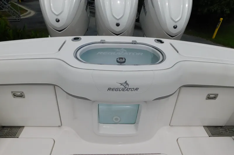 Slide: The Image of 2027 Regulator 35 boat with triple engines and livewell. - 14