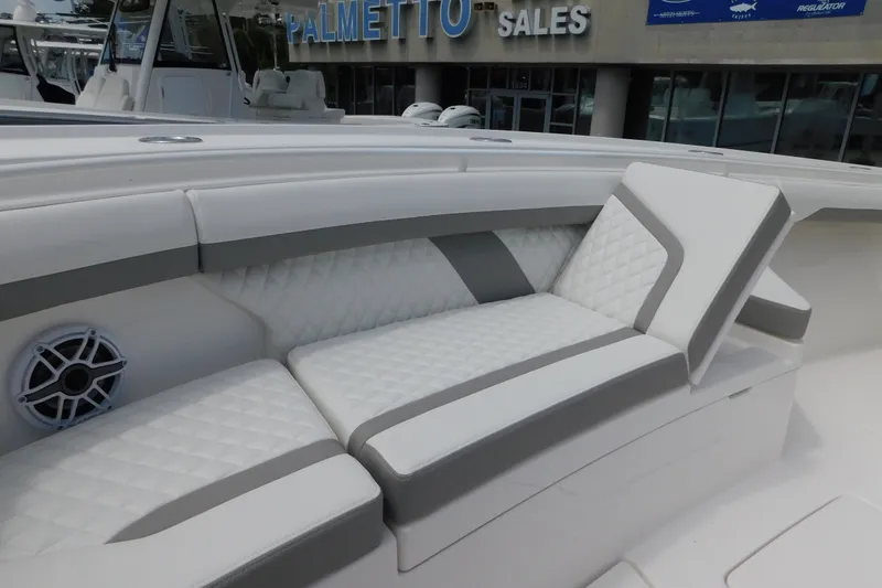 Slide: The Image of Luxurious seating on a 2027 Regulator 35 boat, featuring quilted upholstery and sleek design. - 10