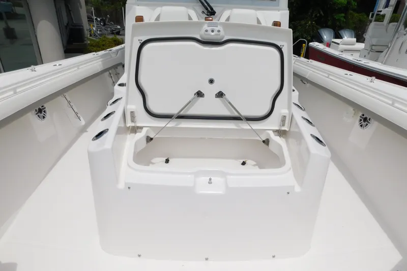 Slide: The Image of 2027 Regulator 35 boat with open storage compartment on deck. - 19