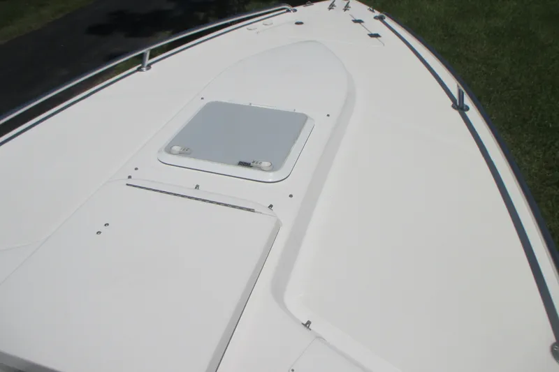 Slide: The Image of 2007 Marlago FS 35 Cuddy boat deck with hatch and railing. - 26
