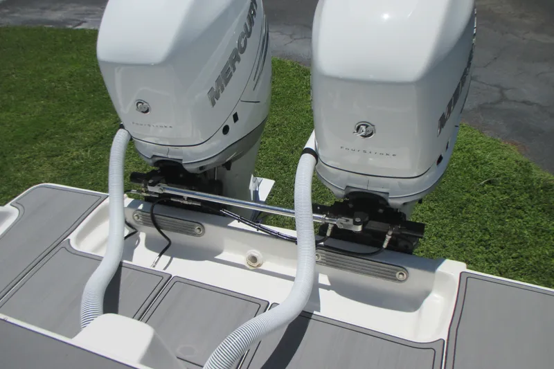 Slide: The Image of Twin Mercury outboard engines on a 2007 Marlago FS 35 Cuddy boat. - 11