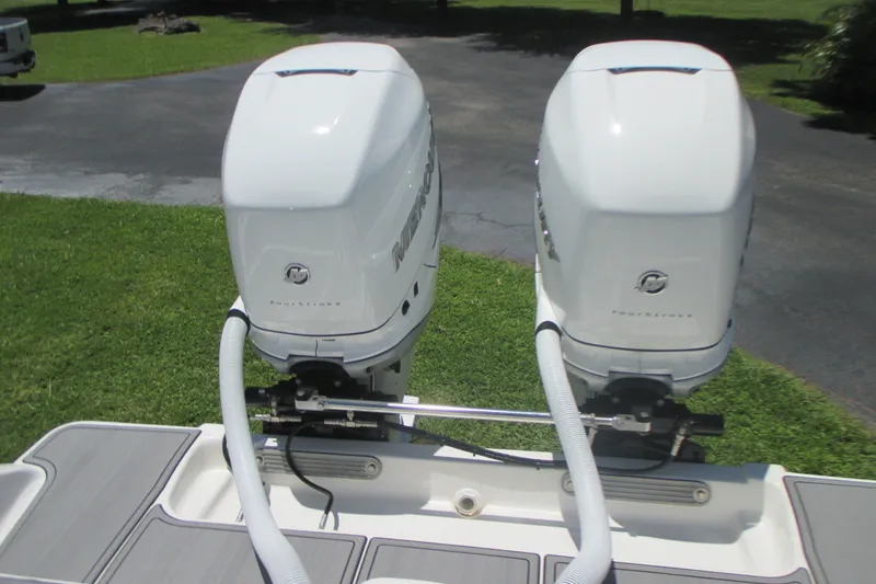 Slide: The Image of Twin Mercury outboard engines on a 2007 Marlago FS 35 Cuddy boat. - 10