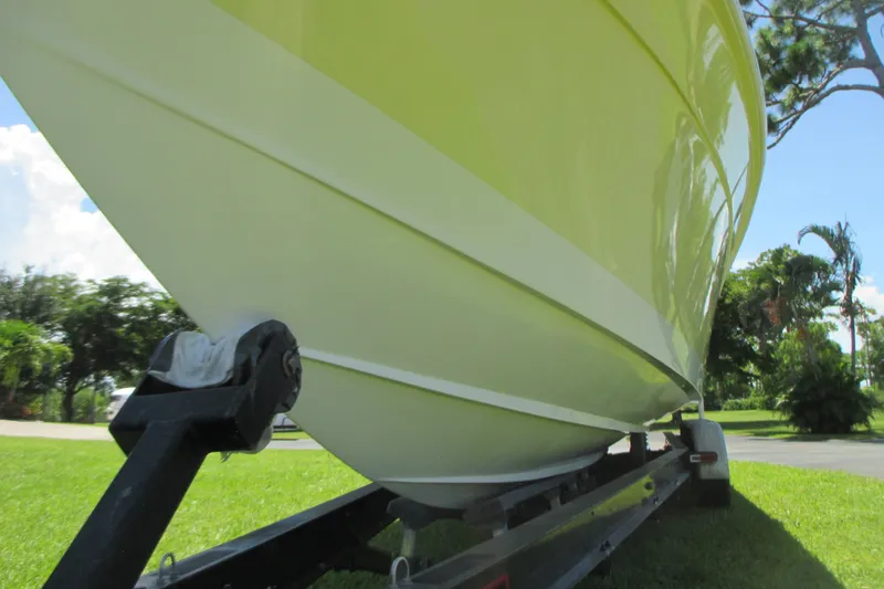 Slide: The Image of 2007 Marlago FS 35 Cuddy boat on trailer, side view, sunny day. - 6