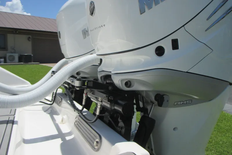 Slide: The Image of 2007 Marlago FS 35 Cuddy boat engines, featuring dual outboard motors. - 9