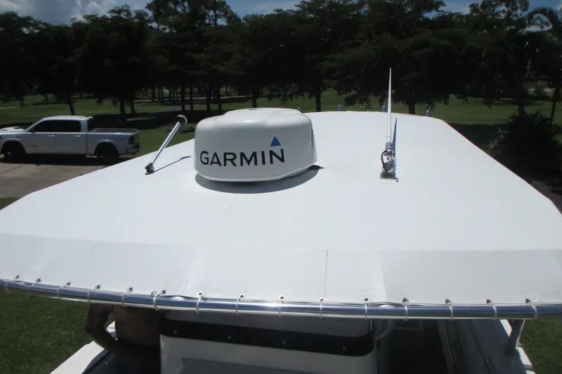 Slide: The Image of 2007 Marlago FS 35 Cuddy boat with Garmin radar on top. - 28