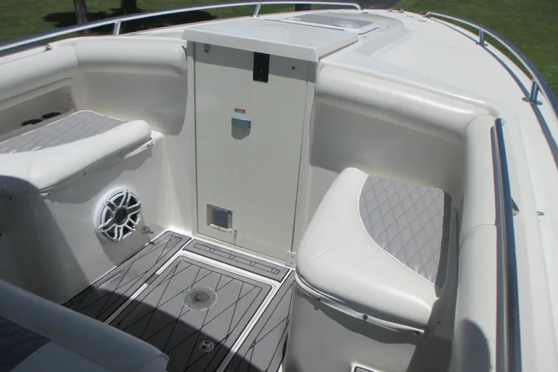 Slide: The Image of 2007 Marlago FS 35 Cuddy interior with cushioned seating and speaker system. - 22