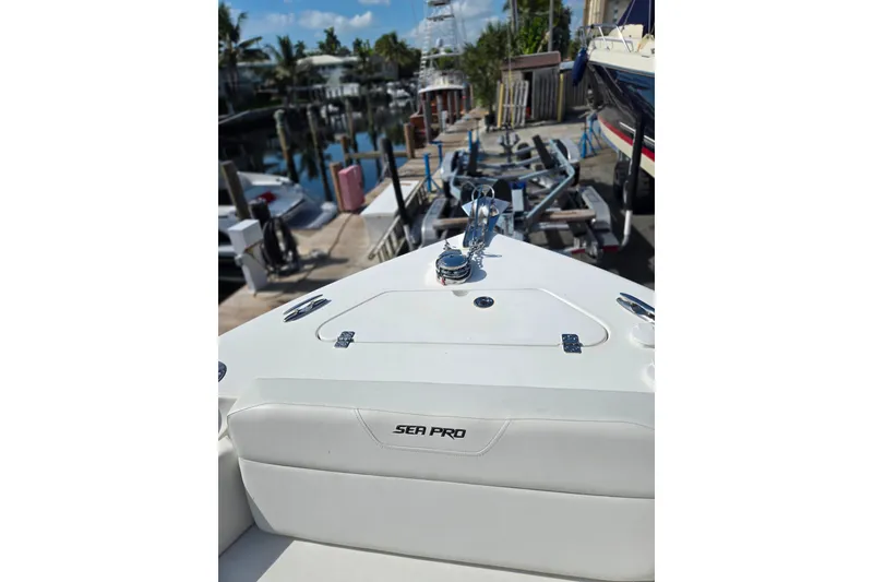 Slide: The Image of 2025 Sea Pro 225FLX Sandbar boat docked, showcasing sleek design and modern features. - 21