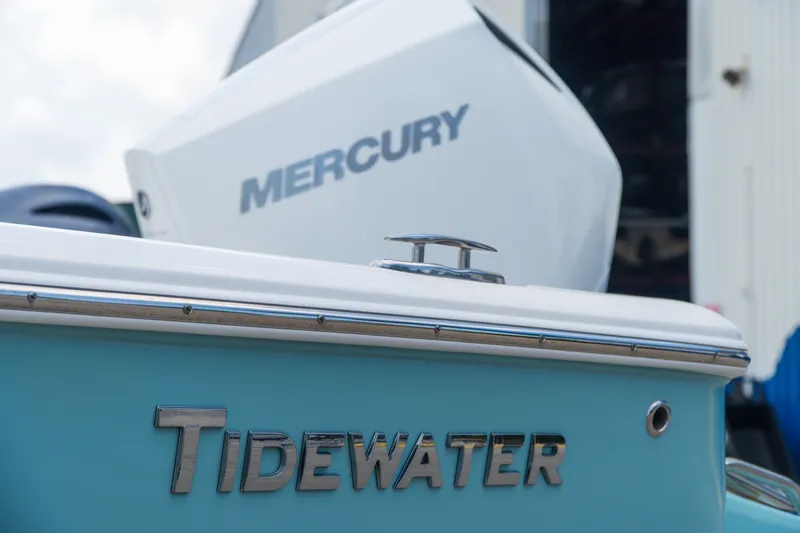 Slide: The Image of 2021 Tidewater 2300 Carolina Bay boat with Mercury engine, close-up view. - 14