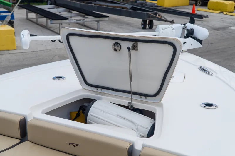 Slide: The Image of Open storage compartment on 2021 Tidewater 2300 Carolina Bay boat deck. - 22