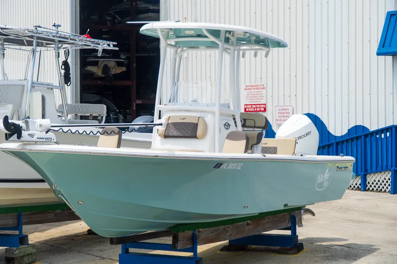 Slide: The Image of 2021 Tidewater 2300 Carolina Bay boat on display, featuring a sleek design and modern amenities. - 43