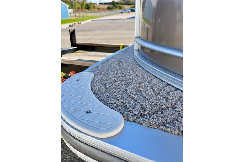 Slide: The Image of Close-up of 2013 South Bay 417 CR boat's carpeted deck and railing. - 53