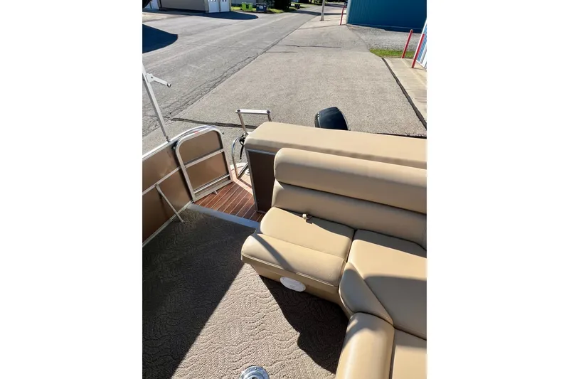 Slide: The Image of 2013 South Bay 417 CR pontoon boat interior with beige seating and open deck view. - 30