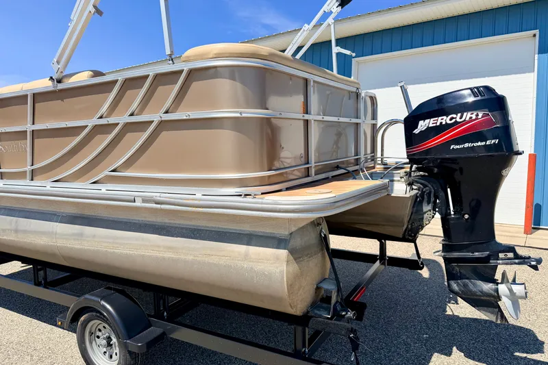 Slide: The Image of 2013 South Bay 417 CR pontoon boat with Mercury FourStroke EFI engine on trailer. - 10