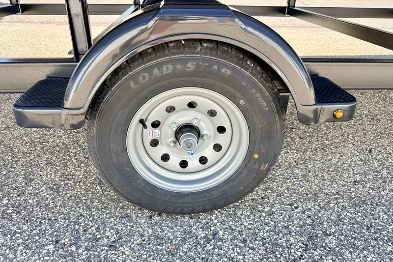 Slide: The Image of Trailer wheel with Loadstar tire on a 2013 South Bay 417 CR. - 78