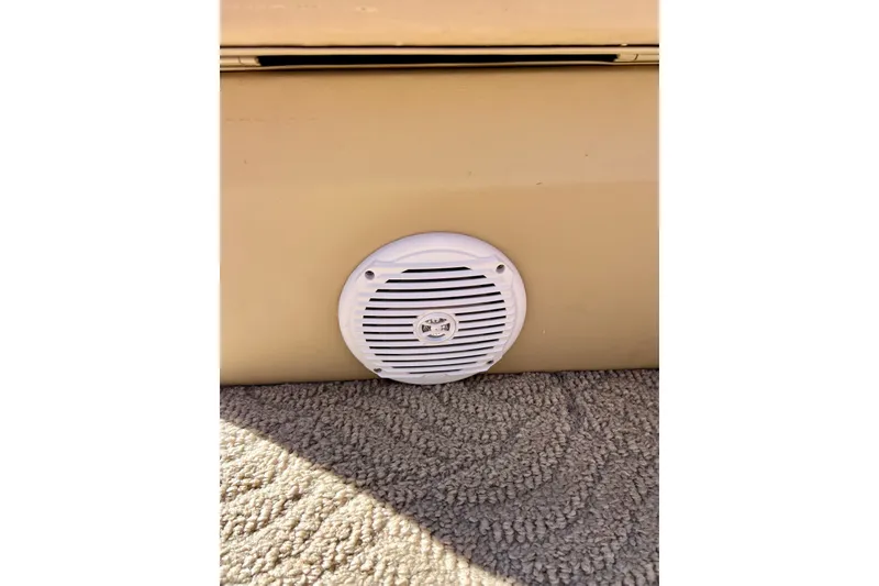Slide: The Image of White speaker on beige surface, South Bay 417 CR, 2013 model, with carpeted floor. - 43