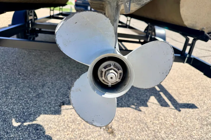 Slide: The Image of Close-up of a 2013 South Bay 417 CR boat propeller on a trailer. - 17